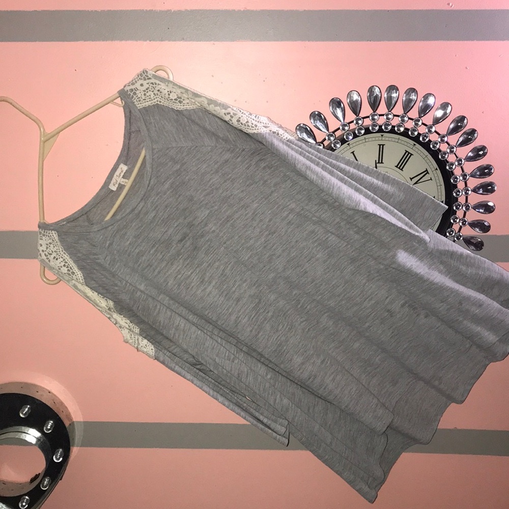 Boutique top w/ lacey detail around cold shoulder